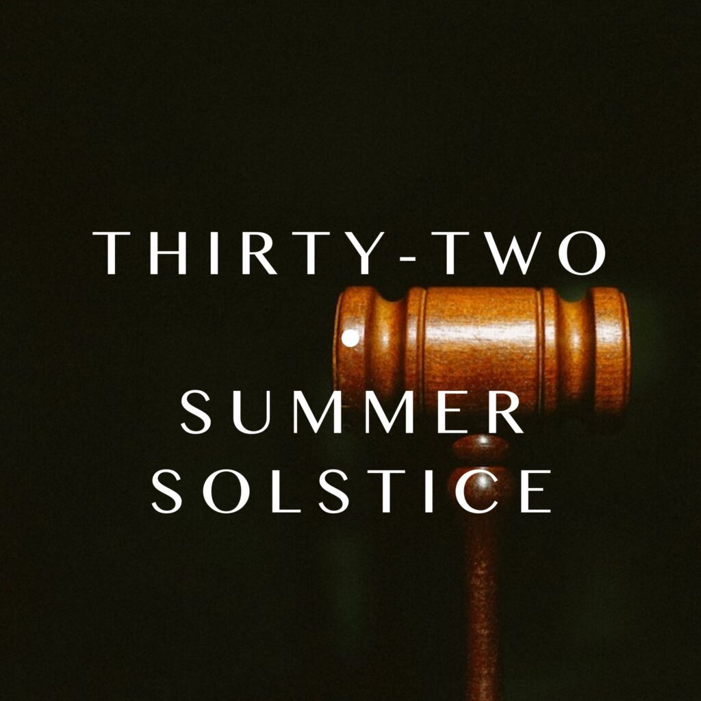 Black background, wooden gavel; Thirty-Two Summer Solstice