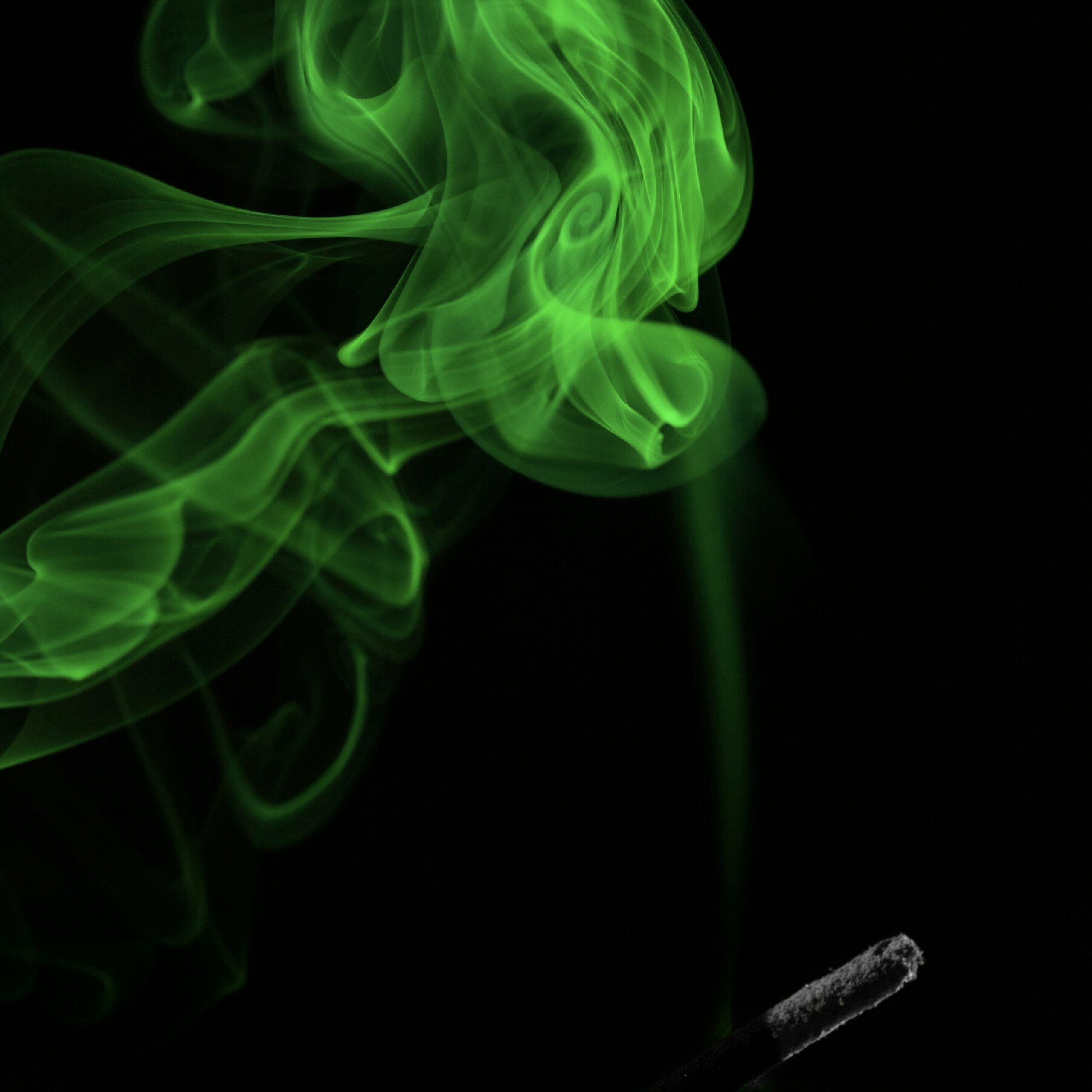 Neon green cigarette smoke